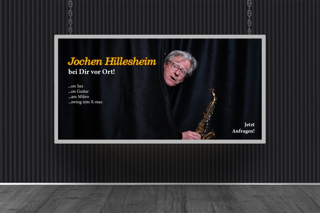 Jochen Hillesheim als Buchbarer Musiker auf einer Werbetafel in Bad Honnef.